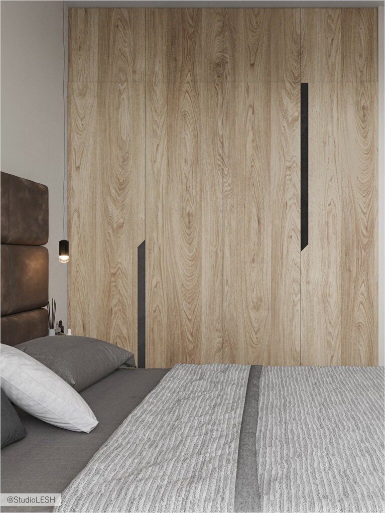 Сочетание деревянного шкафа и пастельной кровати