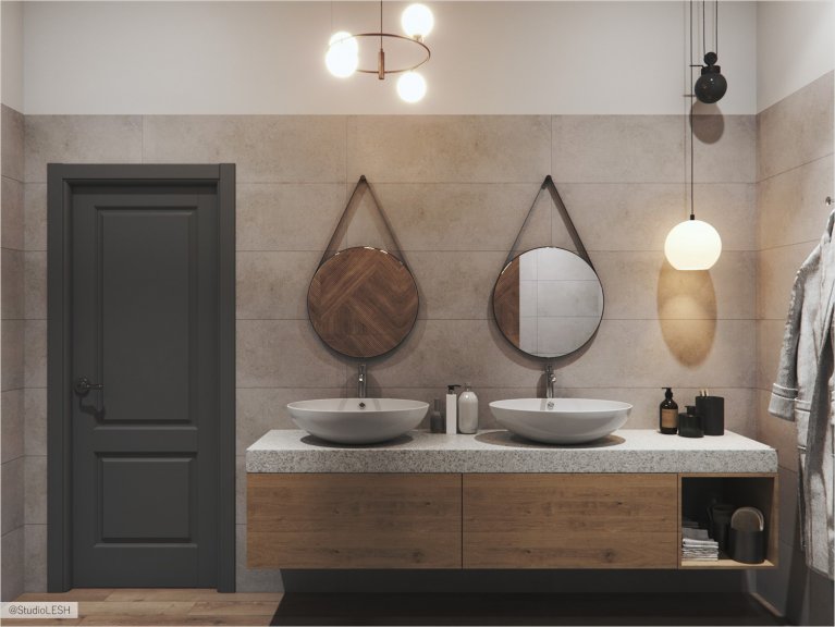 Двойная раковина в ванной комнате с круглыми зеркалами для подчеркивания геометрии