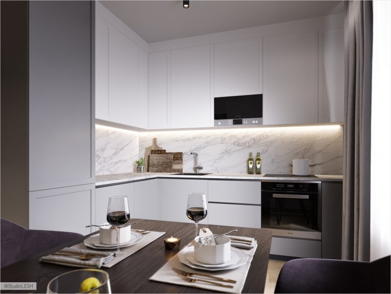 Белая угловая кухня с гладкими фасадами