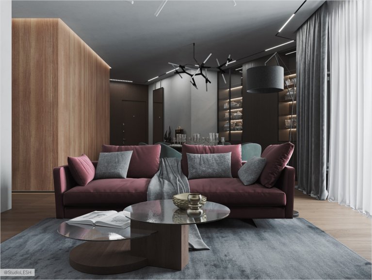 Просторная гостиная с ярким диваном и кубом в светлой отделке