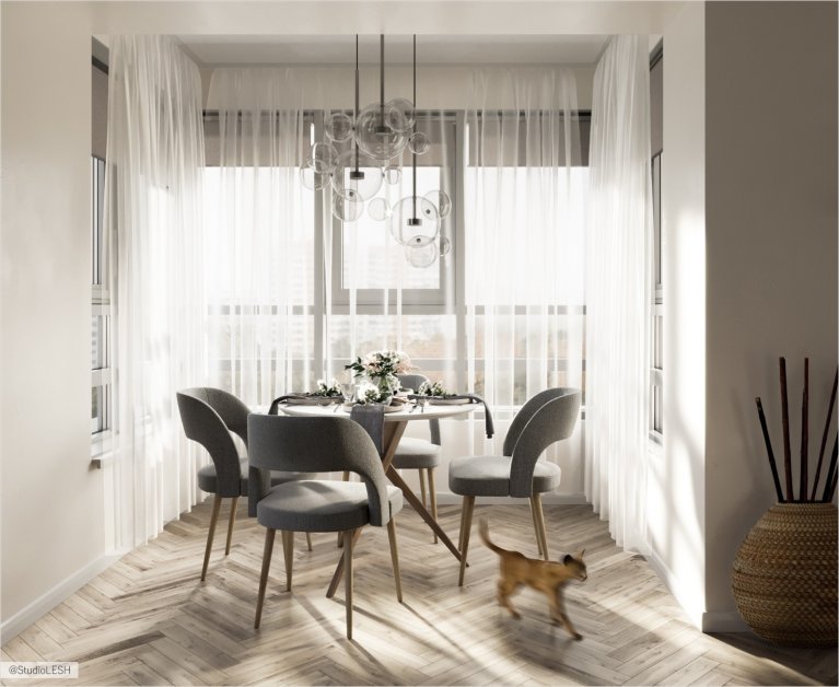 Столовая в эркере c большим количеством естественного света