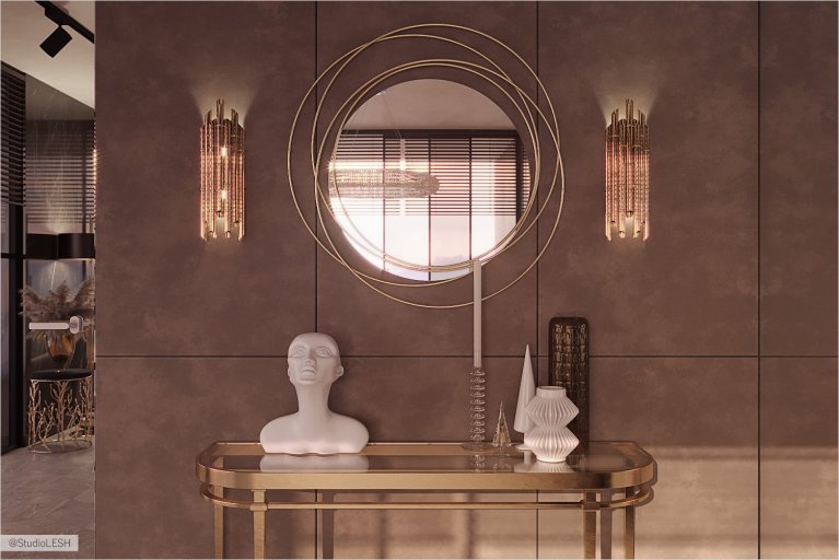 Round mirror in the bedroom with a console and designer things