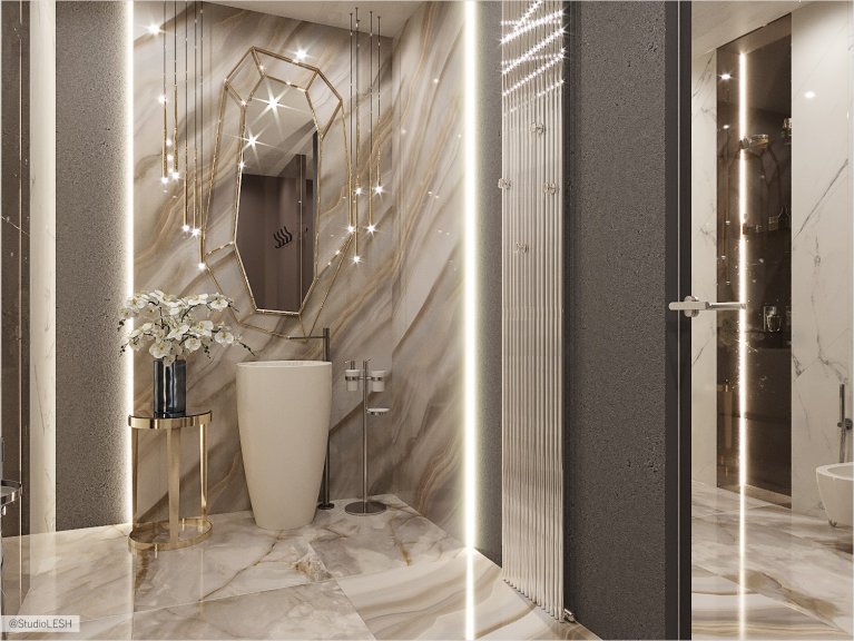 Floor-to-ceiling heated towel rail in the bathroom with golden geometry