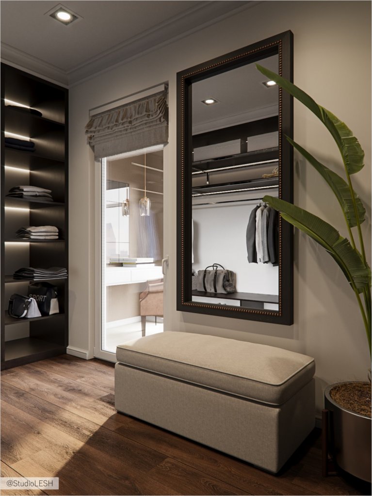  Dressing room with a large mirror and an additional door