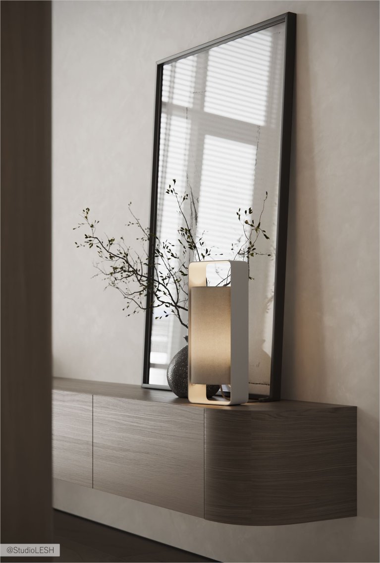 Интерьер современной комнаты с большим прямоугольным зеркалом в черной раме, минималистичным декором и светлыми стенами.