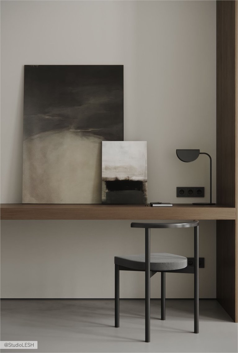 Современный кабинет с рабочим столом, картинами и минималистичным декором.