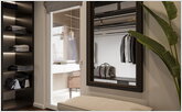  Dressing room with a large mirror and an additional door